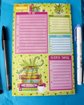 Colorful notepad with various sections on a blue background